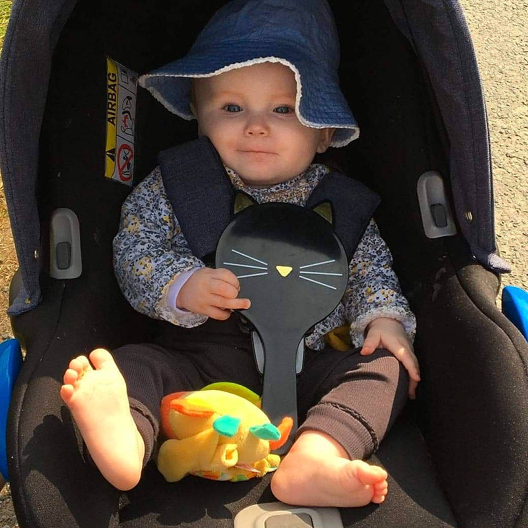 Chelsea is registered to the contest to win money with this photo: baby, baby_carriage, baby_in_car_seat, baby_products, car_seat, child, fun, headwear, person, product, sitting, skin, smile, toddler, vacation