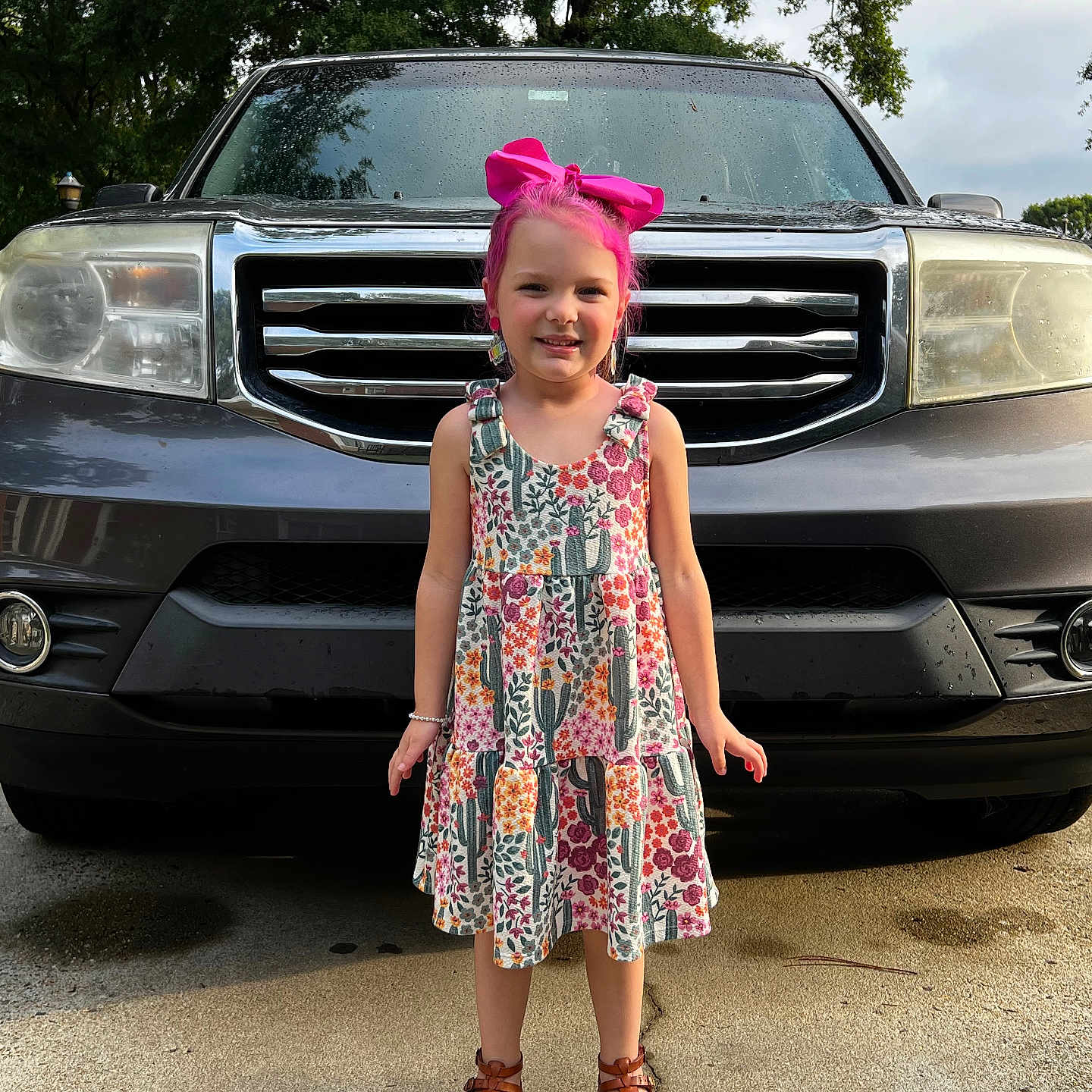 Nataliya is registered to the contest to win money with this photo: alloywheel, car, carwheel, clothing, dress, face, footwear, head, licenseplate, machine, person, photography, portrait, skirt, spoke, suv, tire, transportation, vehicle, wheel