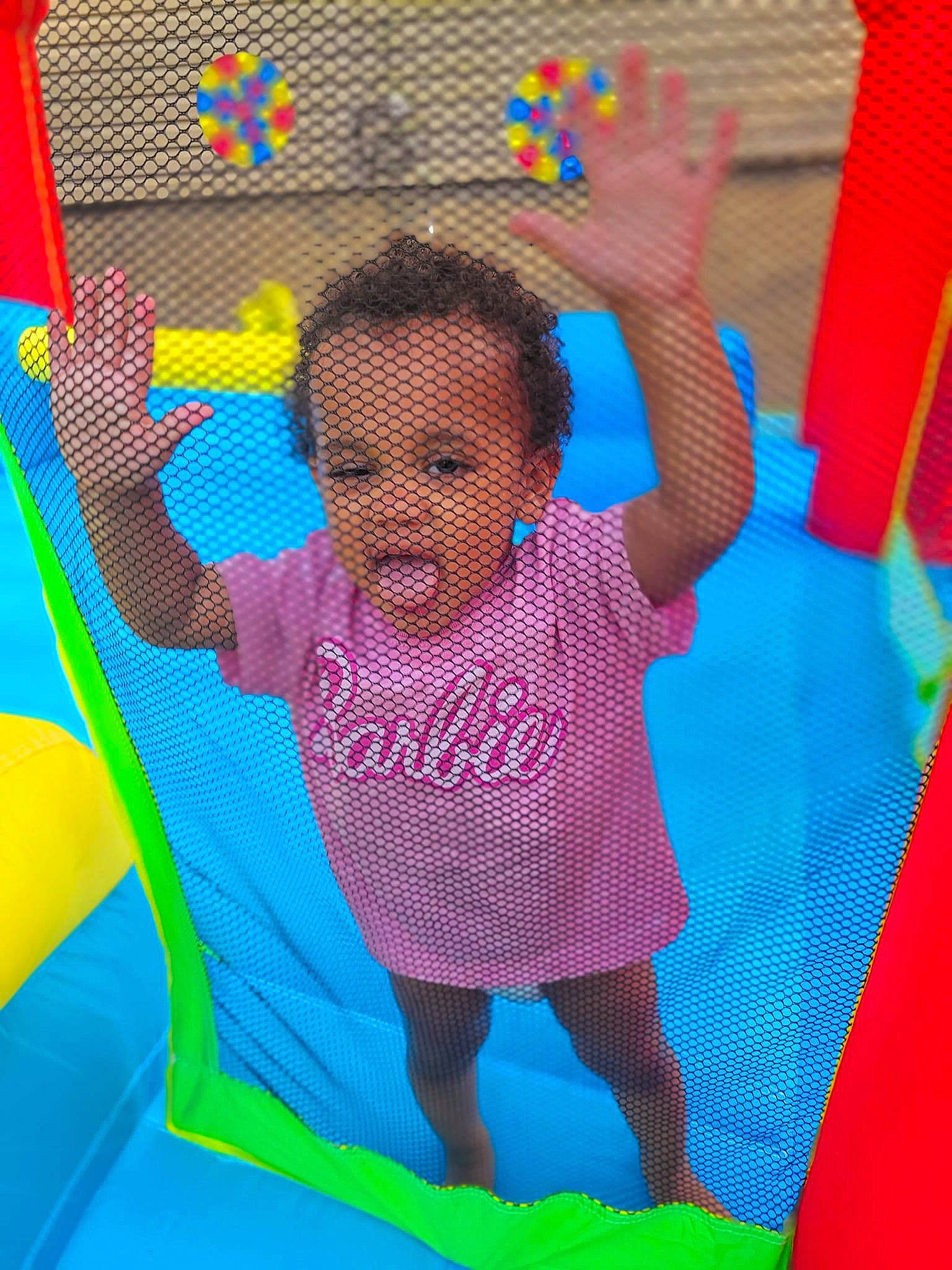 Kadasia is registered to the contest to win money with this photo: baby, baby_toddler_clothing, bounce_house, child, chute, circle, city, fun, happy, leisure, magenta, outdoor_play_equipment, pattern, person, play, playground, recreation, toddler