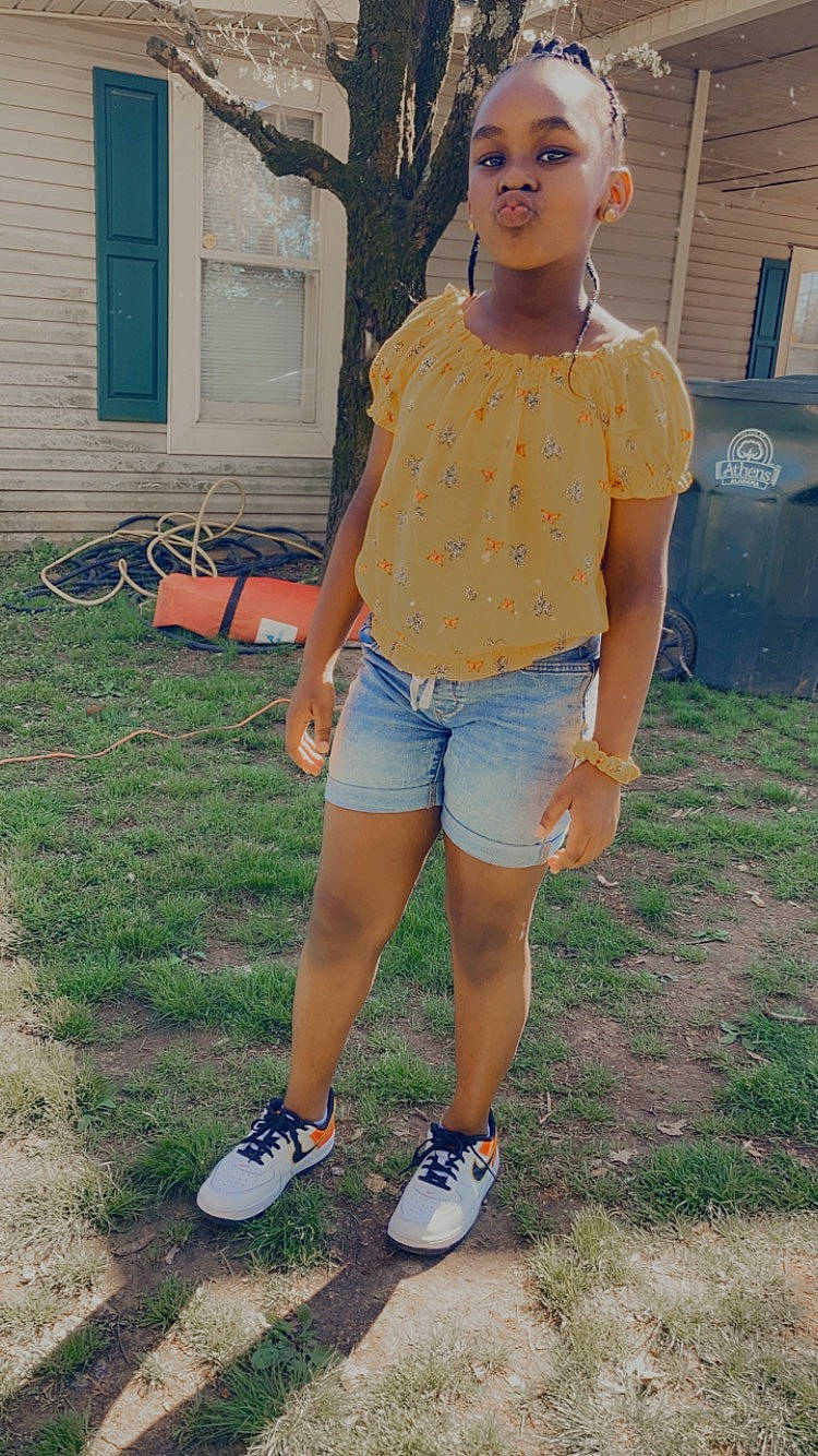 Zaniyah joined the competition — help win amazing prizes! cool, denim, electric_blue, eyewear, grass, human_leg, jean_short, knee, leisure, person, plant, shoe, shorts, shoulder, standing, street_fashion, t_shirt, thigh, trunk, waist