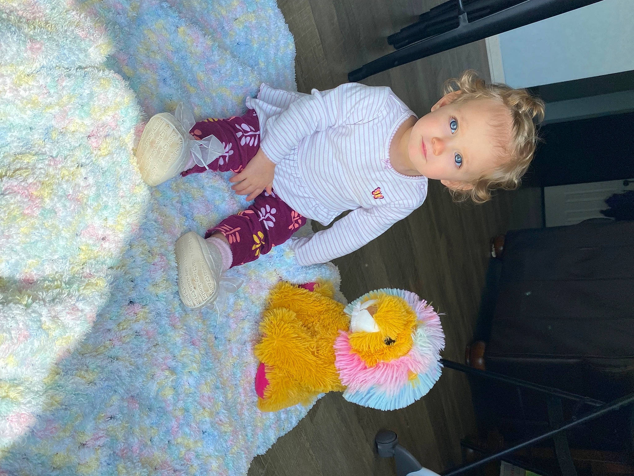 Liberty is registered to the contest to win money with this photo: baby, baby_products, baby_toddler_clothing, baby_toys, child, comfort, flower, fun, linens, pattern, person, petal, room, sitting, toddler, toy