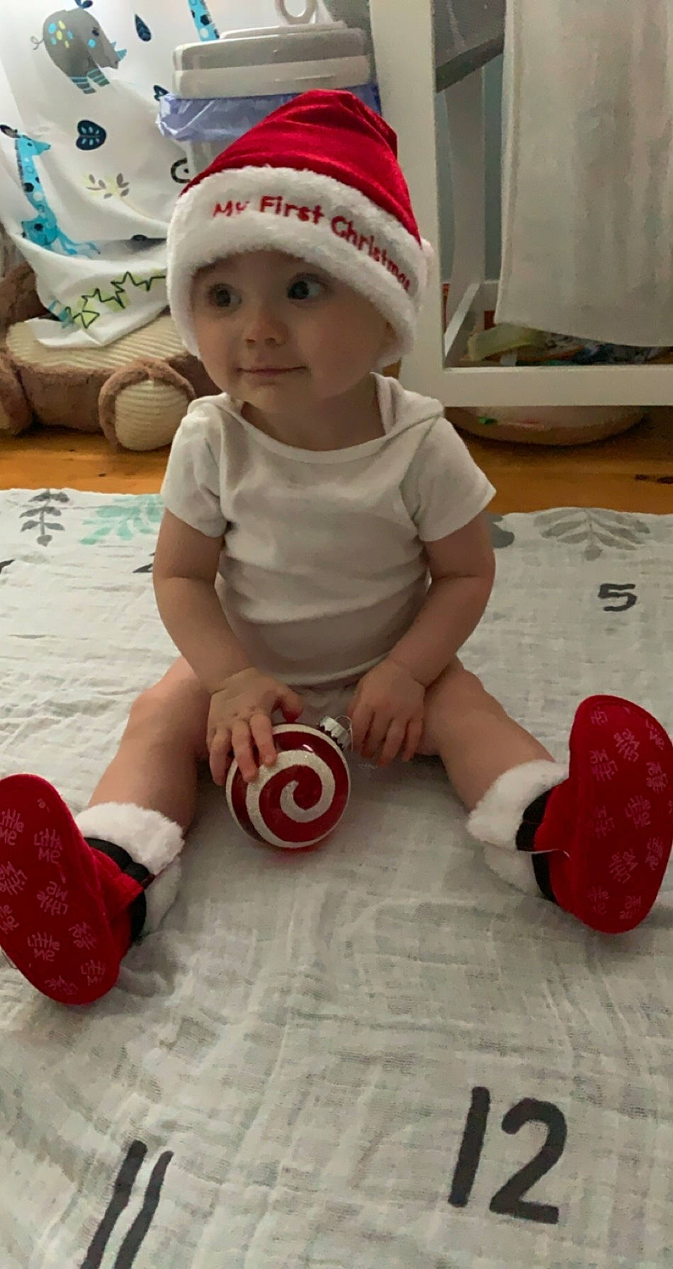 Rowan joined the competition — help win amazing prizes! ankle, baby, baby_playing_with_toys, baby_products, baby_toddler_clothing, baby_toys, beanie, bonnet, carmine, child, costume_hat, headwear, human_body, linens, person, play, sock, toddler, toy