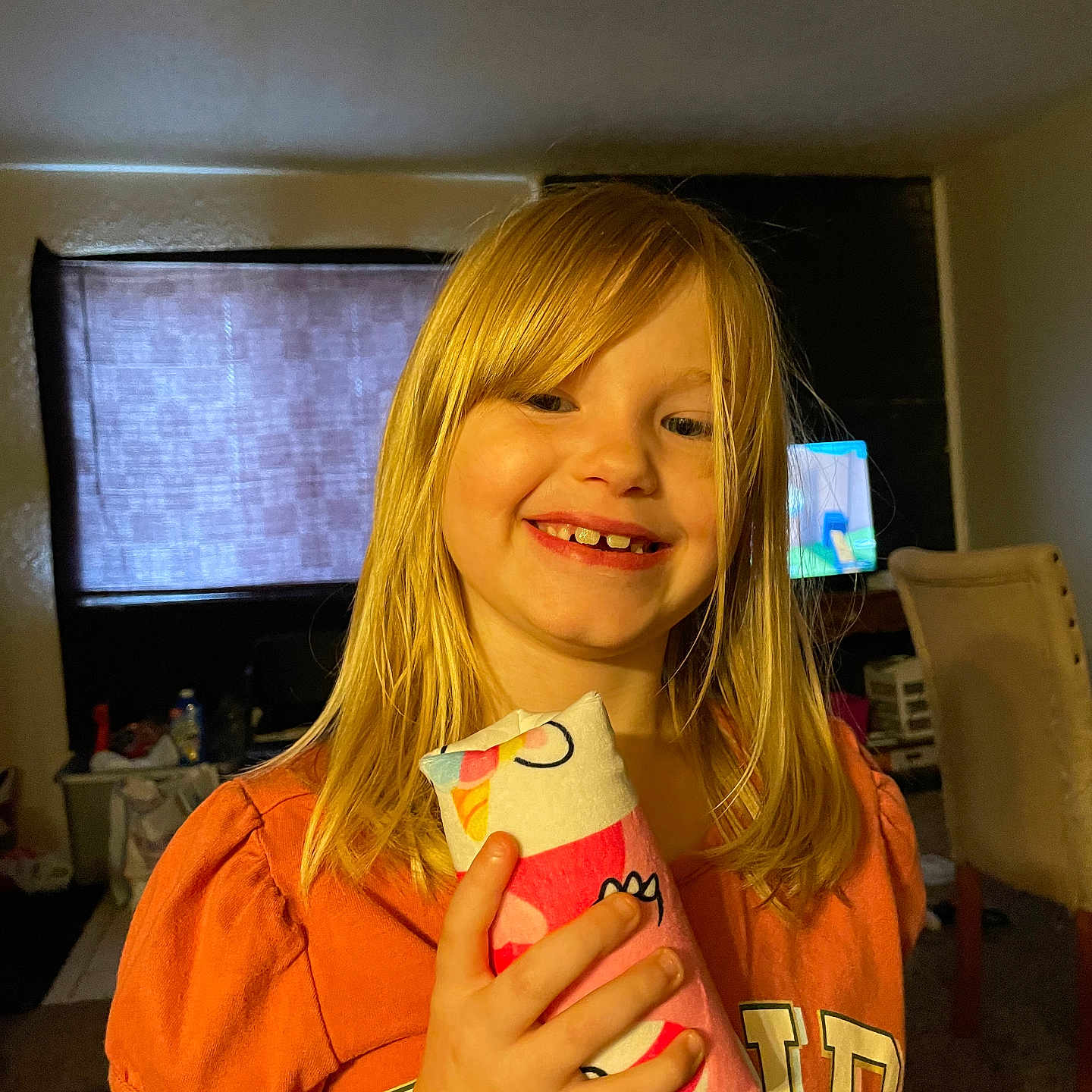 Abigail is registered to the contest to win money with this photo: bodypart, chair, child, computerhardware, cream, electronics, face, female, finger, furniture, girl, hand, hardware, head, monitor, person, photography, portrait, screen, tv