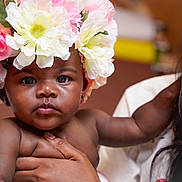 Malani joined the competition — help win amazing prizes! baby, child, close_up, cute, expression, face, family, floral, flower_crown, happy, headwear, holding, indoor, infant, love, mother, person, portrait, skin, smiling_woman