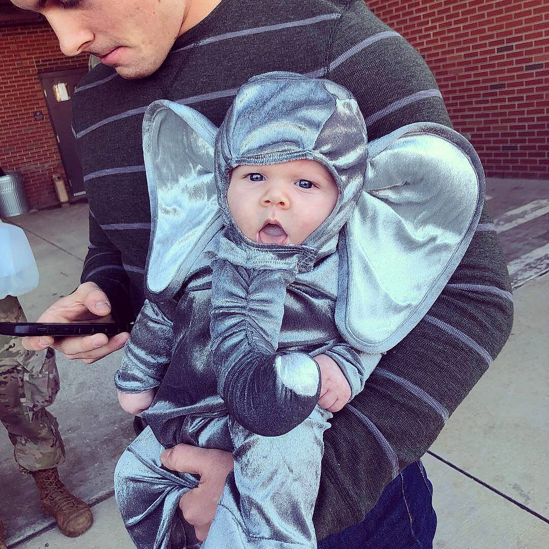 Abram joined the competition — help win amazing prizes! baby, cheek, child, cool, electronic_device, face, family, happy, head, headgear, headwear, jacket, jeans, mountain, outerwear, people, person, sitting, sky, smile