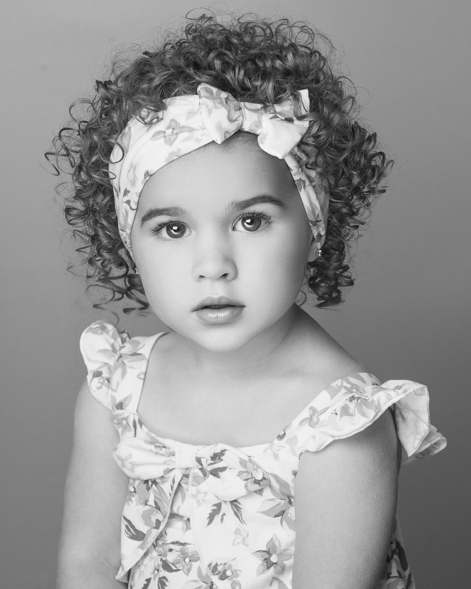 Aubrianna is registered to the contest to win money with this photo: black, black_and_white, eye, eyebrow, eyelash, fashion_design, flash_photography, hairstyle, happy, head, headgear, headpiece, headwear, iris, lip, monochrome, monochrome_photography, organ, person, photograph