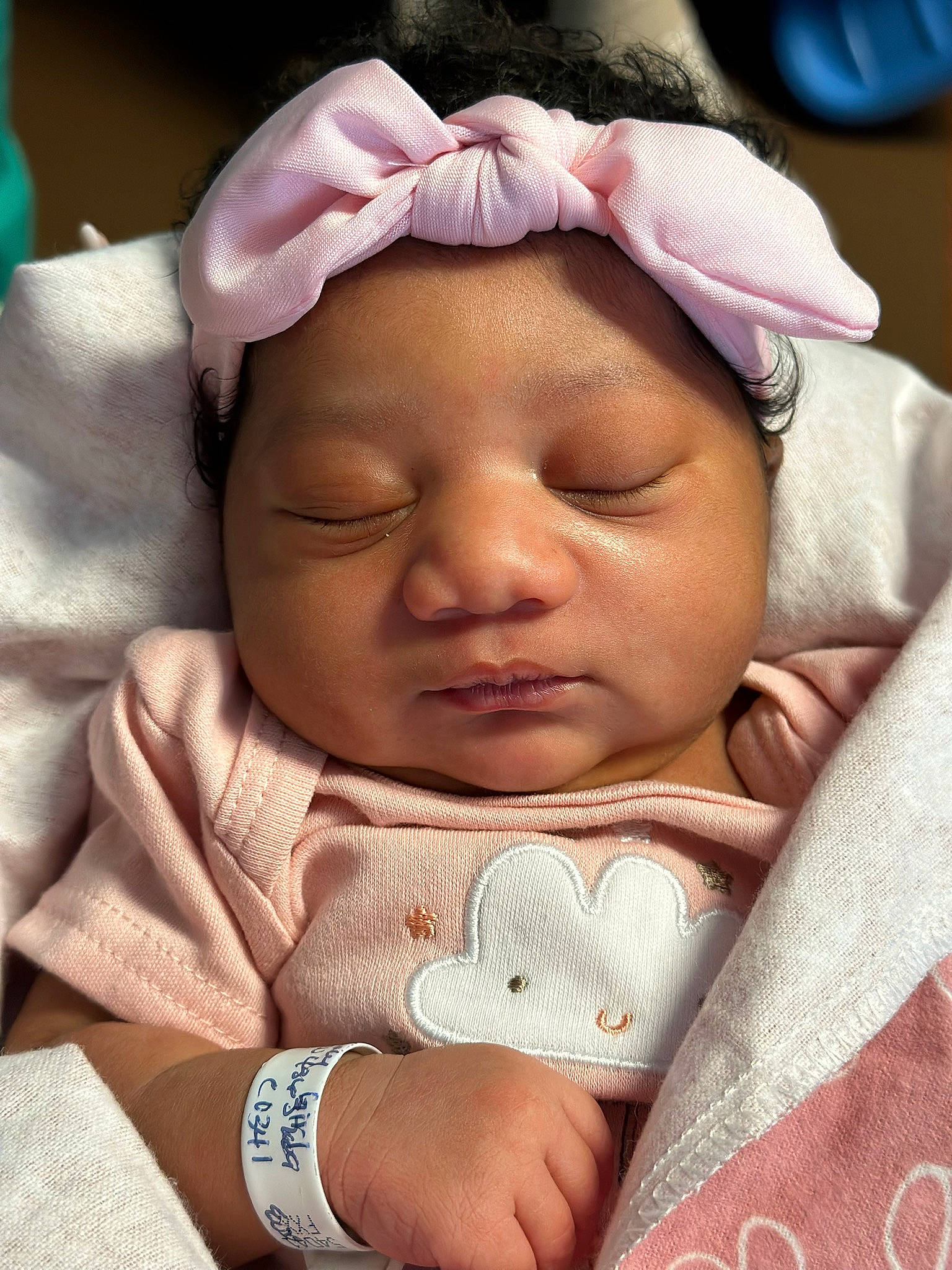 Jasmine is registered to the contest to win money with this photo: baby, baby_sleeping, cheek, child, comfort, eye, eyebrow, eyelash, face, happy, head, headwear, linens, lip, mouth, nose, person, pink, skin, smile