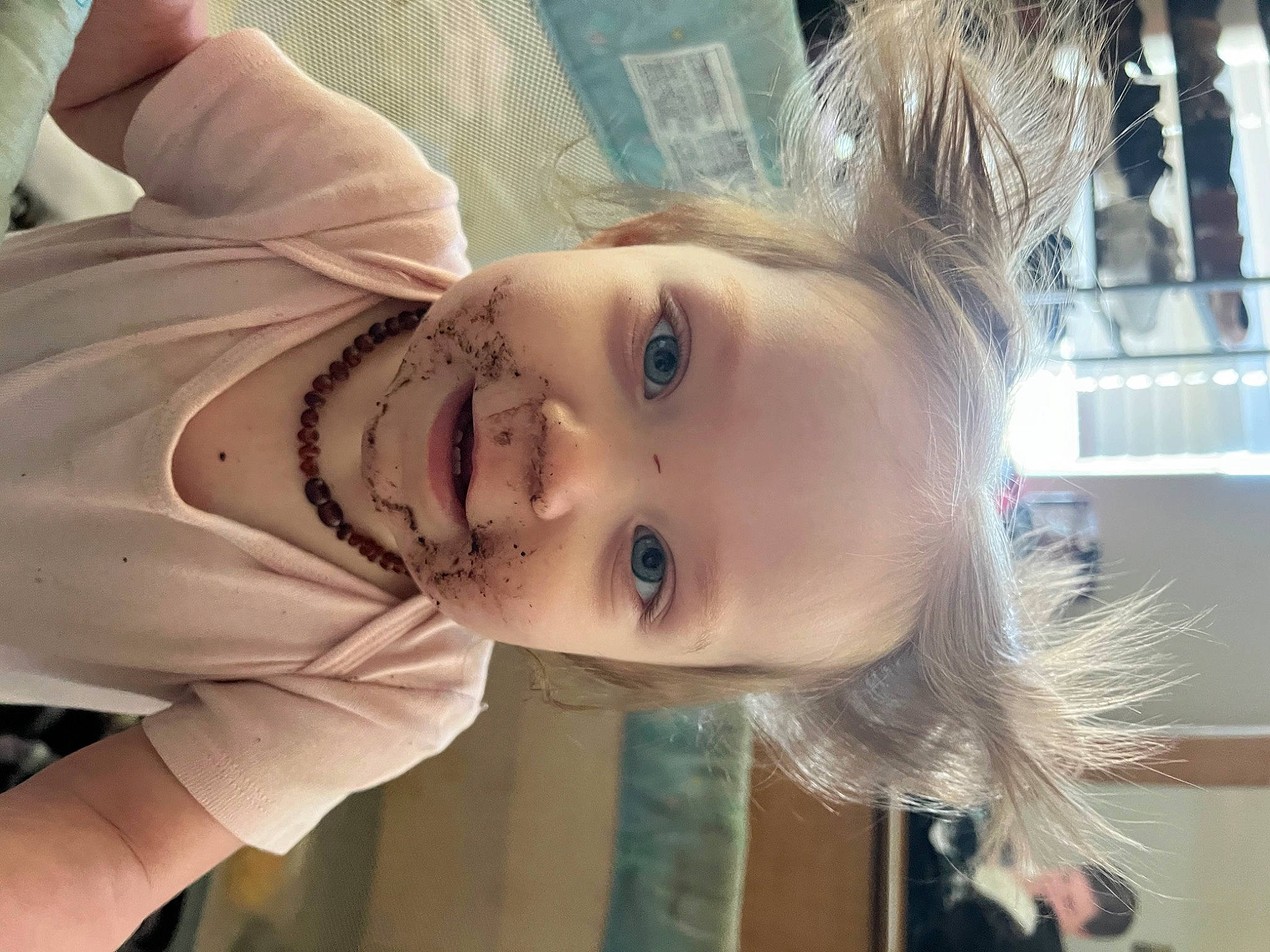 Chloe is registered to the contest to win money with this photo: bangs, blond, brown_hair, ear, eye, eyebrow, eyelash, flash_photography, fun, hair, happy, iris, joy, lip, long_hair, nose, person, plant, skin, smile