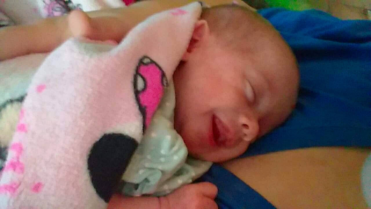 Leona is registered to the contest to win money with this photo: cheek, child, ear, finger, hand, head, infant, mouth, nap, neck, nose, person, product, skin, sleep, toddler