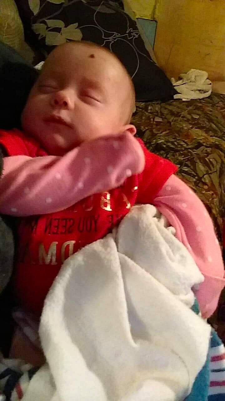 Leona is registered to the contest to win money with this photo: cheek, child, day, infant, lap, person, product, skin, sleep, toddler