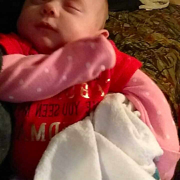 Leona is registered to the contest to win money with this photo: cheek, child, day, infant, lap, person, product, skin, sleep, toddler