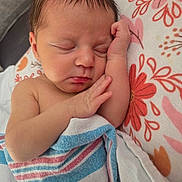 Sophia joined the competition — help win amazing prizes! newborn, baby, sleeping, blanket, pillow, face, skin, hair, hand, arm, closeup, indoors, resting, peaceful, child, infant, soft, comfort, cute, portrait