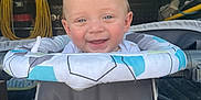 Daxx joined the competition — help win amazing prizes! baby, smiling, infant, baby_seat, socks, happy, face, person, indoor, tools, storage, background, container, equipment, sitting, clothing, head, footwear, toy, playtime