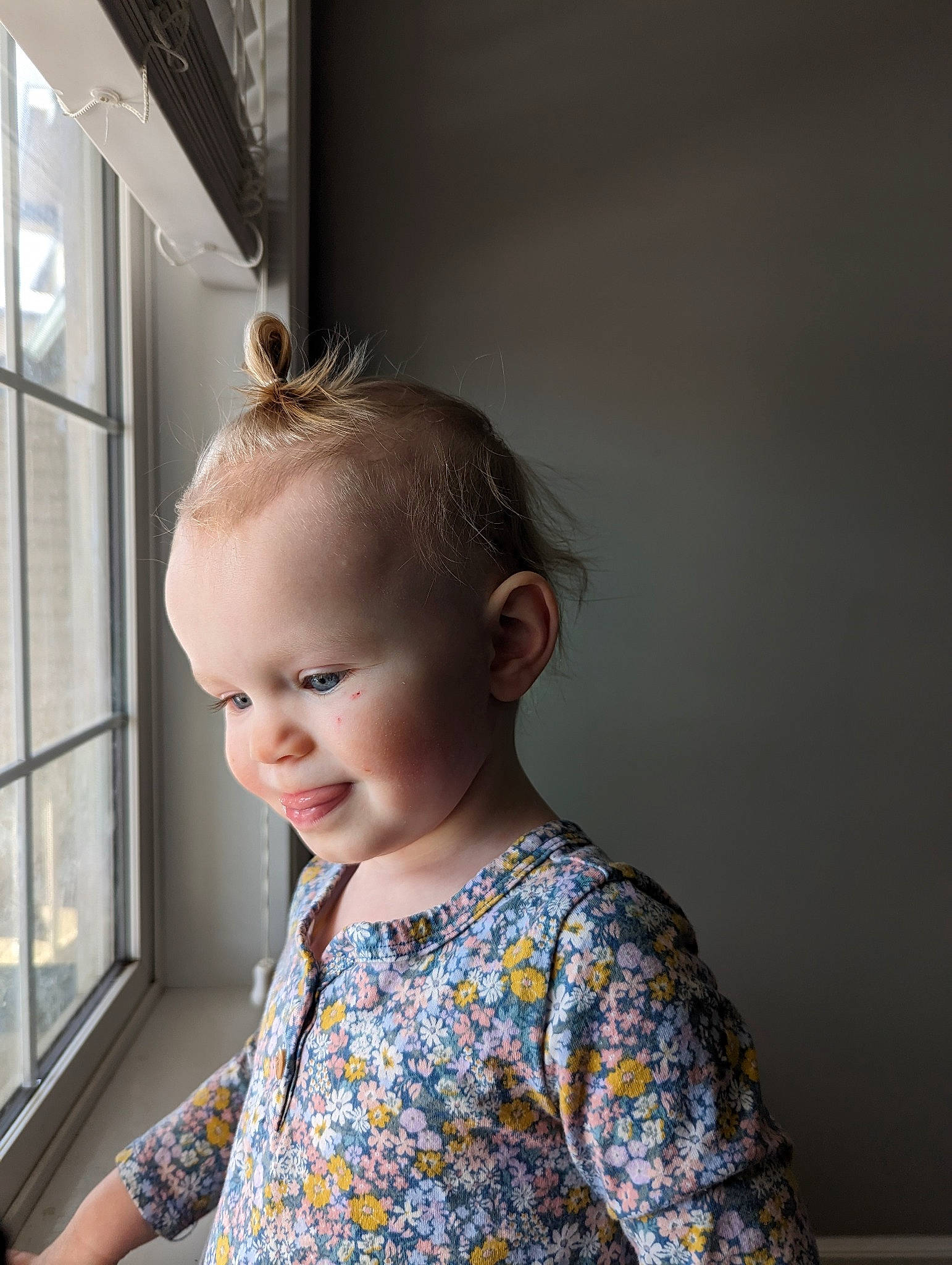 Willa is registered to the contest to win money with this photo: baby, baby_toddler_clothing, cheek, child, day_dress, dress, flash_photography, flooring, fun, happy, iris, pattern, person, portrait_photography, sitting, sleeve, smile, t_shirt, toddler, window
