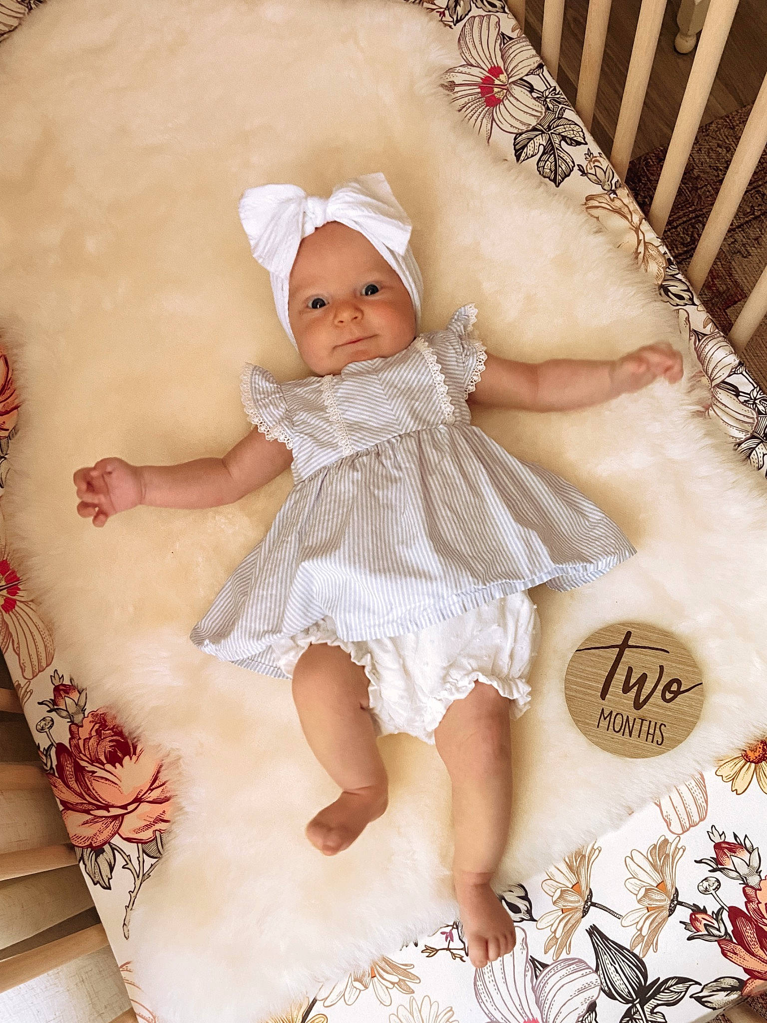 Adelaide joined the competition — help win amazing prizes! baby, baby_products, baby_toddler_clothing, child, comfort, dress, embellishment, fashion_accessory, happy, headpiece, headwear, linens, pattern, peach, person, pink, product, sitting, skin, sleeve