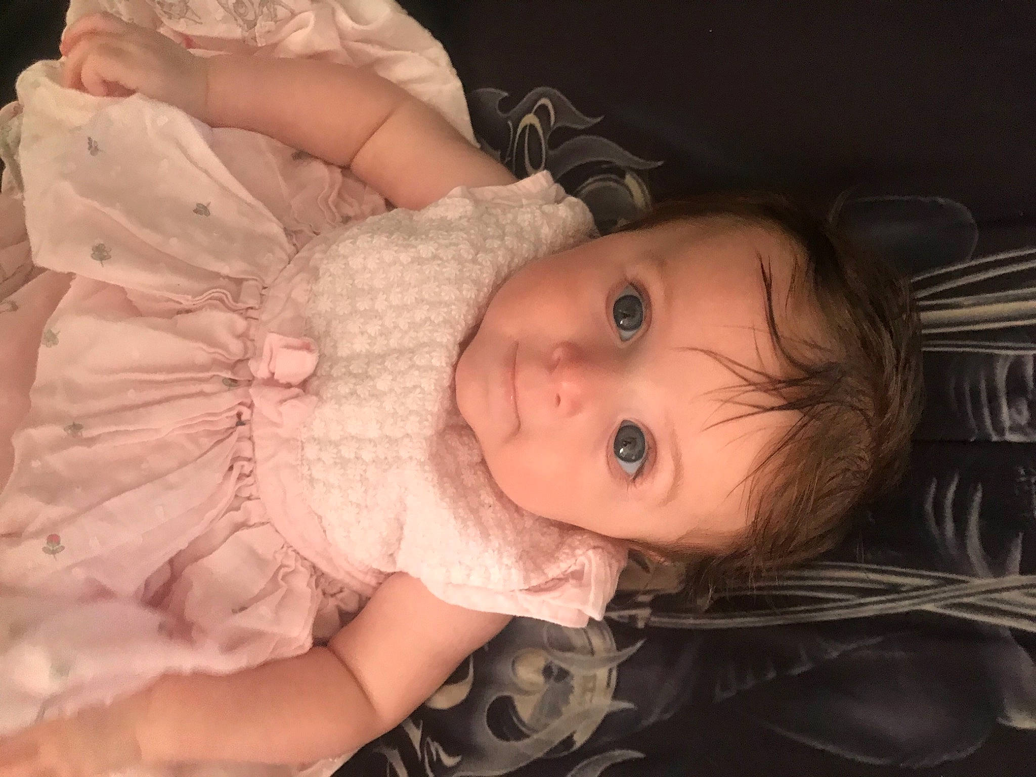 Violet is registered to the contest to win money with this photo: baby_toddler_clothing, cheek, chin, dress, eye, eyebrow, eyelash, facial_expression, flash_photography, hair, hairstyle, head, headgear, human_body, iris, lip, mouth, nose, person, skin