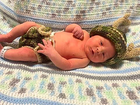 Johnny joined the competition — help win amazing prizes! amphibian, baby, child, comfort, fawn, flooring, grass, headwear, landscape, linens, pattern, people_in_nature, person, reptile, rock, soil, terrestrial_animal, toad, toddler, tree