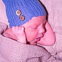 Walker is registered to the contest to win money with this photo: newborn, baby, sleeping, hat, knit_hat, buttons, blanket, cozy, wrapped, infant, cute, soft, warm, resting, child, portrait, indoors, skin, headwear, peaceful