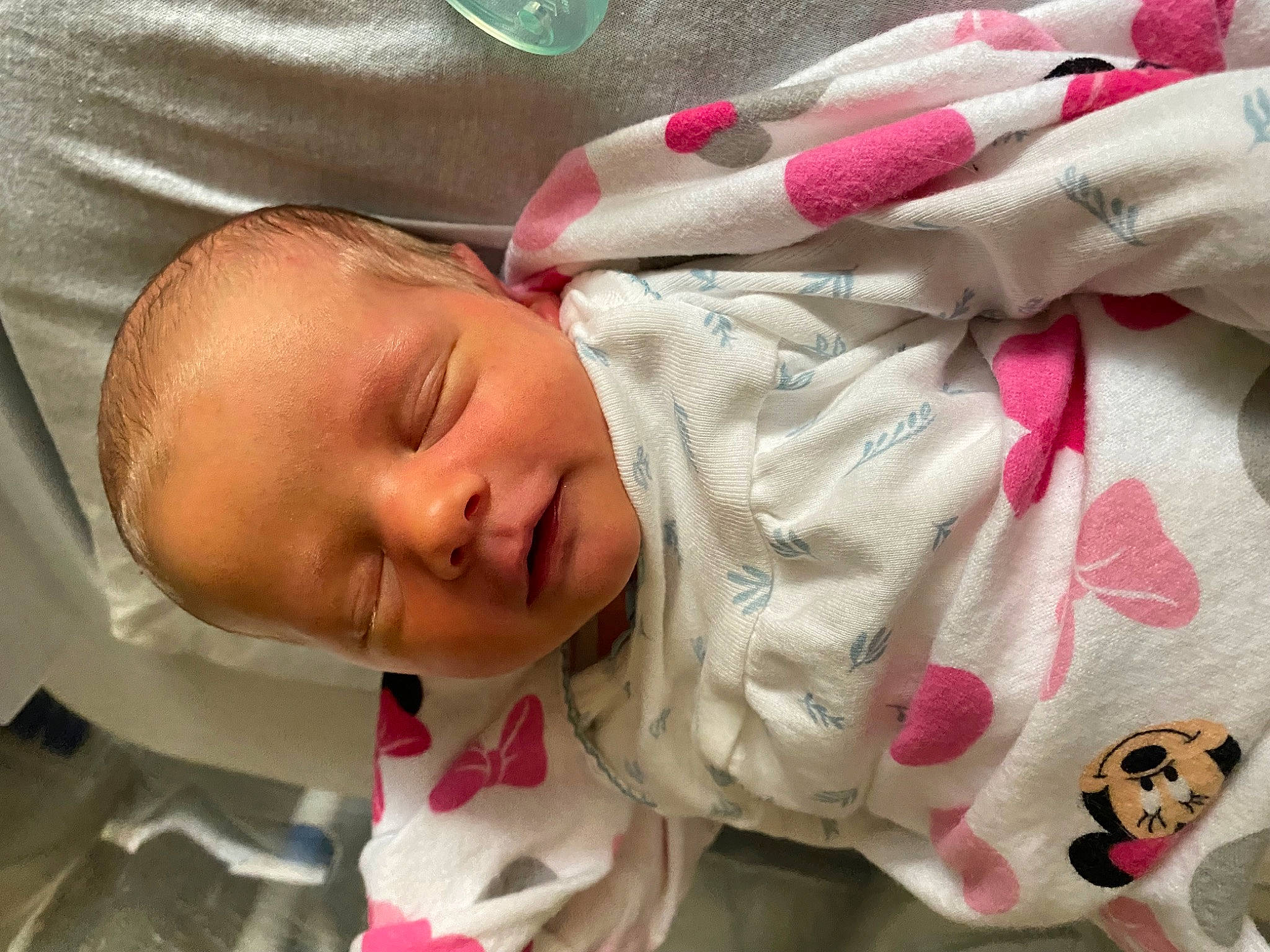 Chloë is registered to the contest to win money with this photo: baby, baby_products, baby_safety, baby_sleeping, baby_toddler_clothing, carmine, cheek, child, comfort, face, head, linens, pattern, person, pink, room, skin, sleep, sleeve, textile