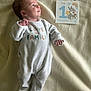 Gabriel participe au concours pour gagner de l'argent avec cette photo : baby, infant, onesie, blanket, milestone_card, cute, lying_down, soft_texture, portrait, child, newborn, cartoon, bunny, celebration, family, sleepwear, gaze, cute_expression, indoor, light