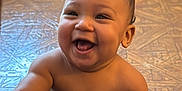 Callen joined the competition — help win amazing prizes! baby, child, smiling, happy, indoor, floor, toy, walker, pants, bare_chest, reaching, cute, infant, person, young_child, playtime, joy, expression, sitting, room