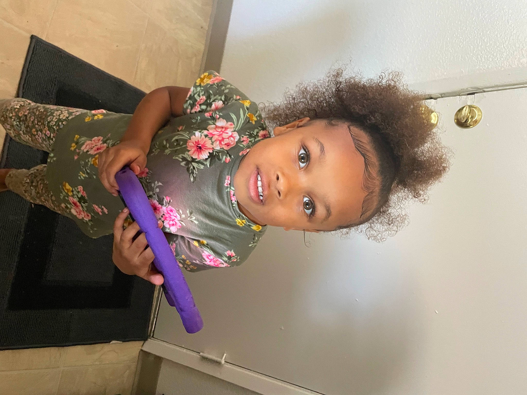 Jillian is registered to the contest to win money with this photo: black_hair, child, costume, eyelash, fashion_accessory, fashion_design, fun, happy, lipstick, magenta, person, room, textile, toddler, window, wrist