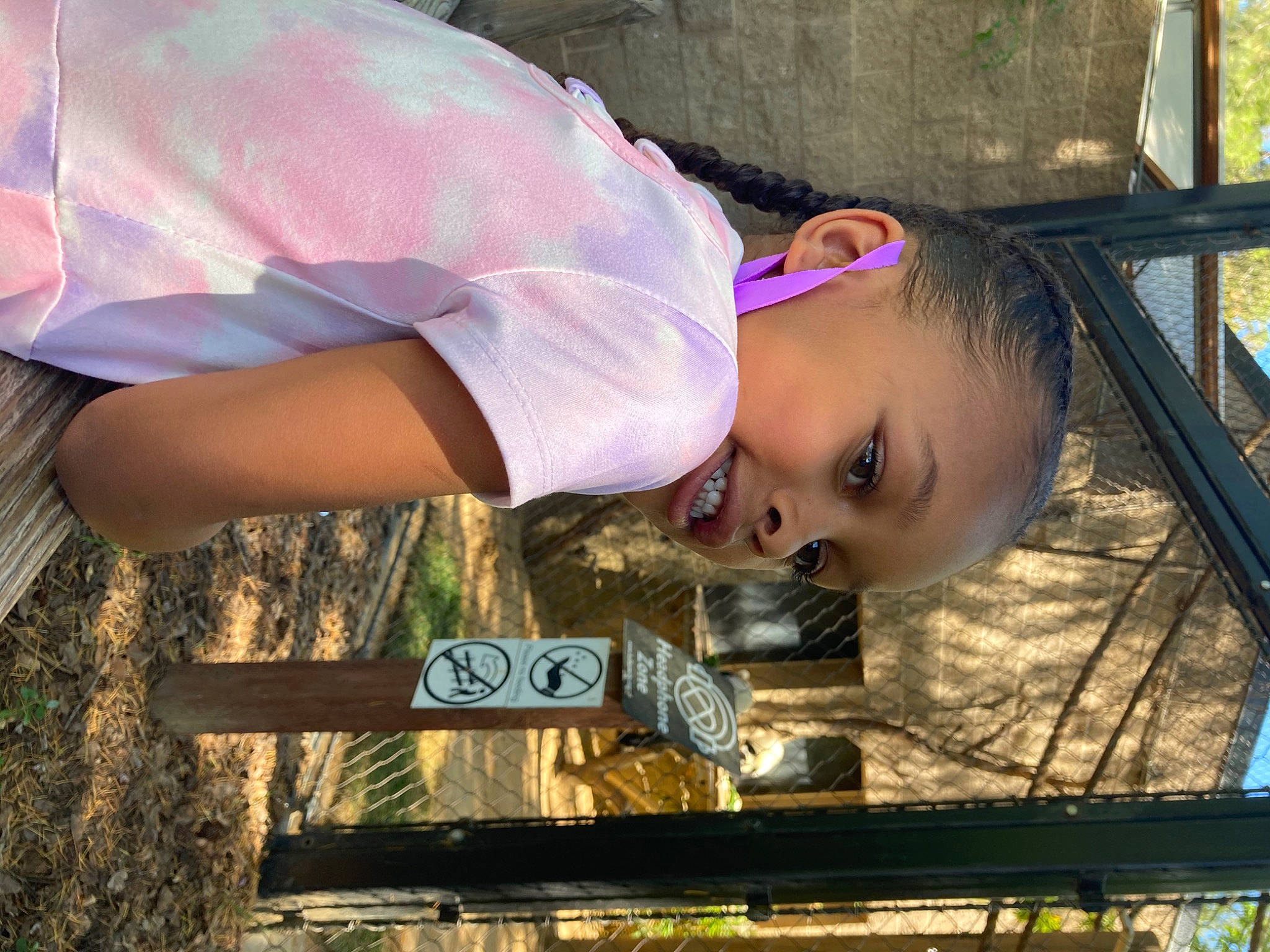 Jillian is registered to the contest to win money with this photo: child, eyewear, fun, grass, happy, landscape, leisure, person, recreation, smile, t_shirt, toddler, tree, vacation, wood