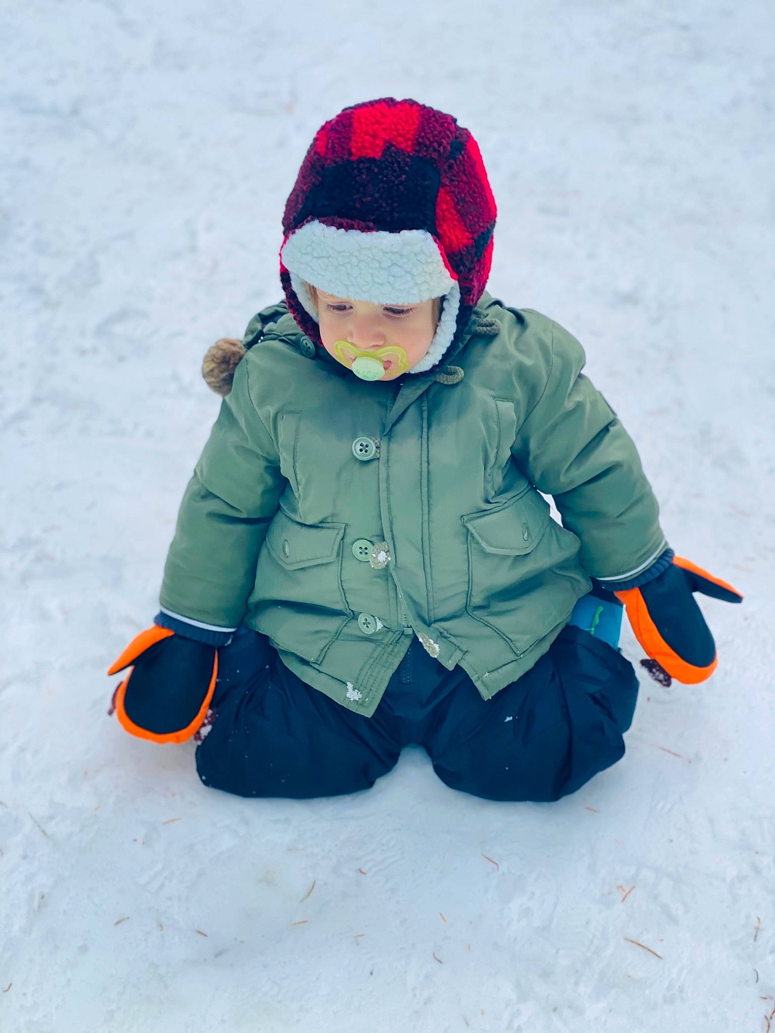 Gustavo joined the competition — help win amazing prizes! cap, electric_blue, freezing, fun, glove, headwear, hood, human_body, ice_cap, jacket, knit_cap, leisure, person, personal_protective_equipment, recreation, sled, sledding, sleeve, slope, snow
