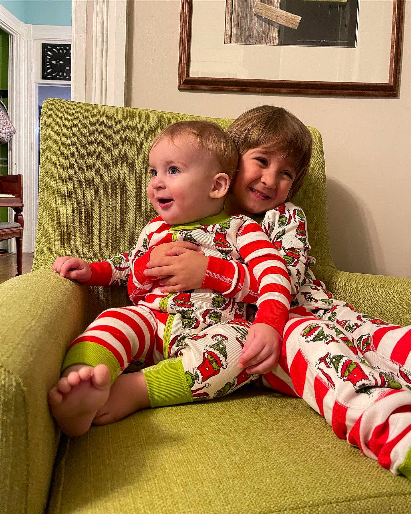 Sullivan joined the competition — help win amazing prizes! baby, baby_toddler_clothing, child, comfort, couch, event, fun, happy, holiday, human_leg, joy, knee, lap, person, picture_frame, room, sitting, sleeve, smile, t_shirt