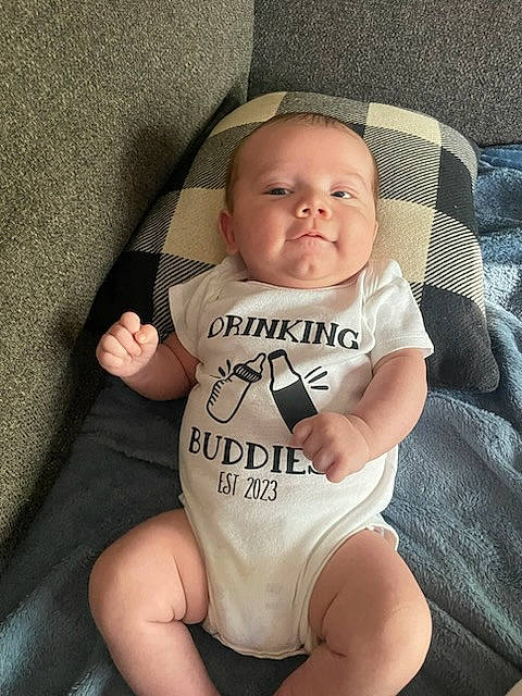 Ashton is registered to the contest to win money with this photo: baby, baby_products, baby_toddler_clothing, cheek, chin, comfort, eye, face, finger, grey, head, iris, knee, leg, person, skin, sleeve, stomach, thigh, toddler