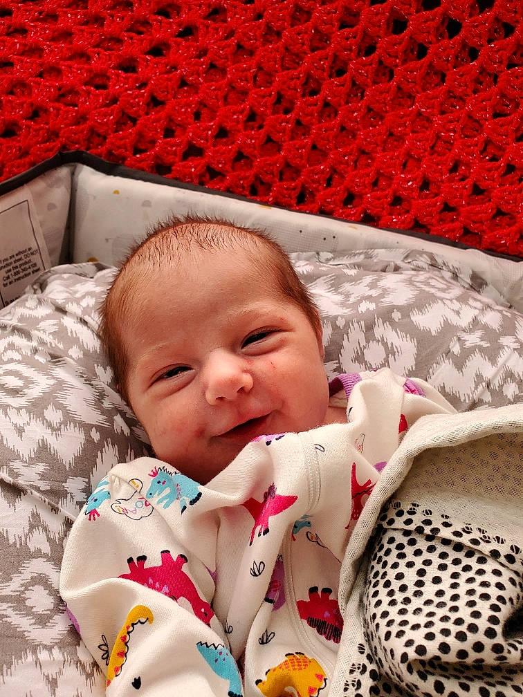 Adilynn is registered to the contest to win money with this photo: baby, baby_products, baby_sleeping, bedtime, blanket, cheek, child, linens, nap, nose, pattern, person, pink, product, sleep, textile, toddler