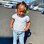 Leeanna is registered to the contest to win money with this photo: car, child, city, clothing, face, female, footwear, girl, head, jeans, machine, pants, person, photography, portrait, shoe, sleeve, transportation, vehicle, wheel
