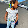 blackhair, braid, car, child, clothing, cornrows, female, footwear, girl, hair, jeans, machine, pants, pedestrian, person, shoe, sleeve, transportation, vehicle, wheel