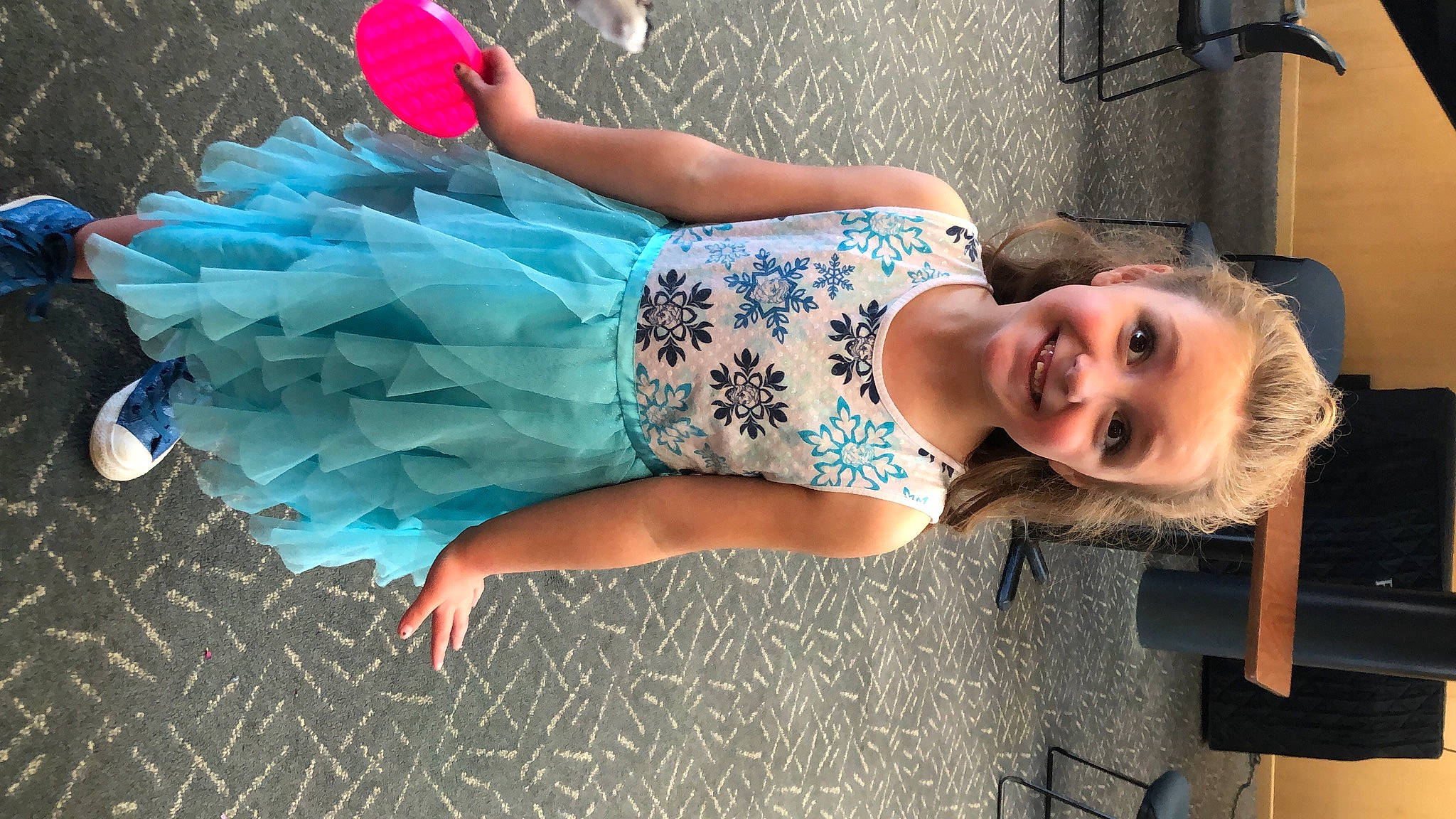 Scotlyn is registered to the contest to win money with this photo: child, cool, dress, electric_blue, eyewear, fashion, fashion_accessory, fun, happy, human_leg, joint, joy, leisure, pattern, person, pink, sitting, smile, street_fashion, thigh