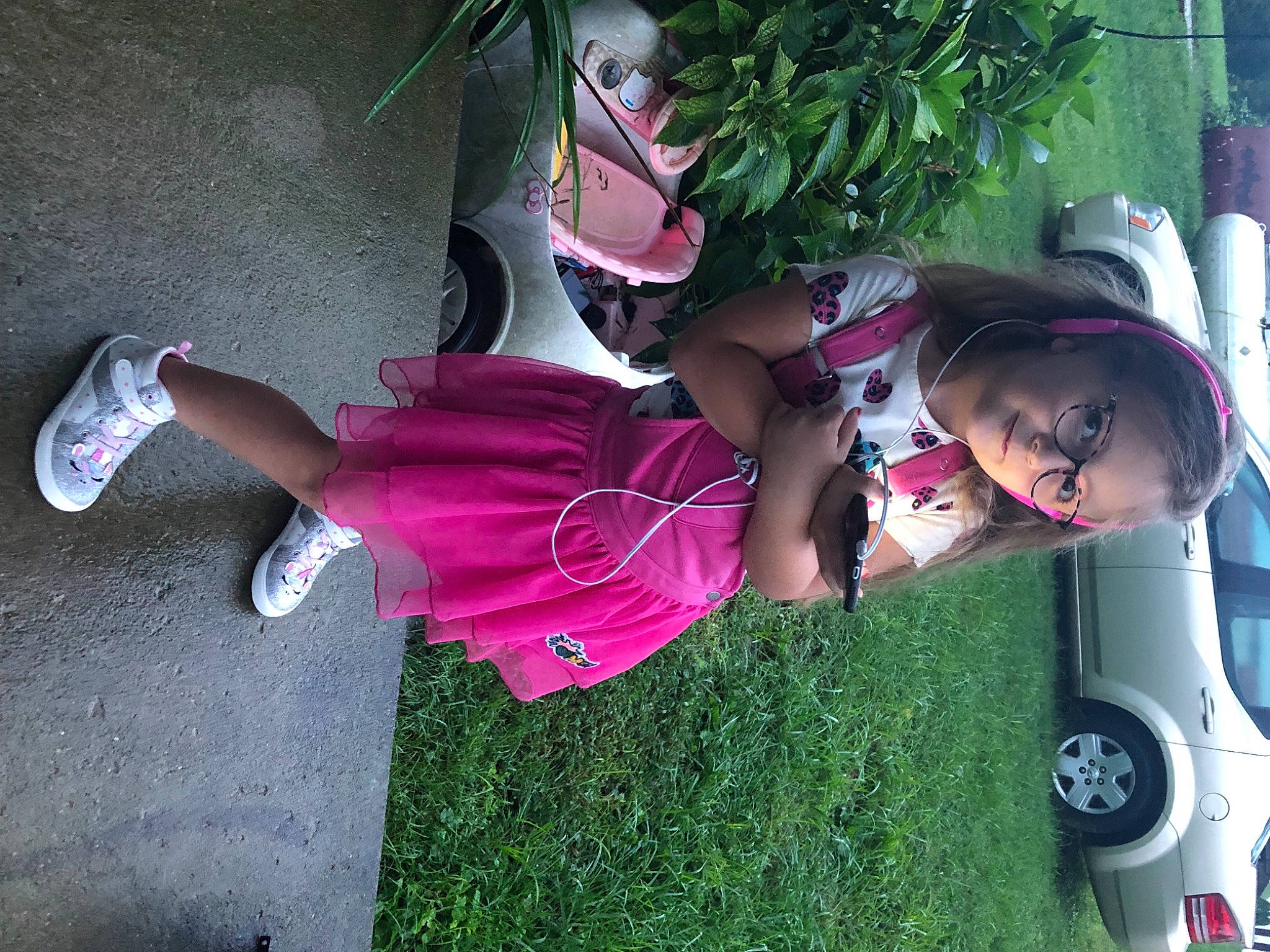 Scotlyn joined the competition — help win amazing prizes! car, cool, footwear, fun, grass, green, happy, hat, human_leg, leg, person, pink, plant, recreation, shoe, sneakers, textile, tire, tree, vehicle_door