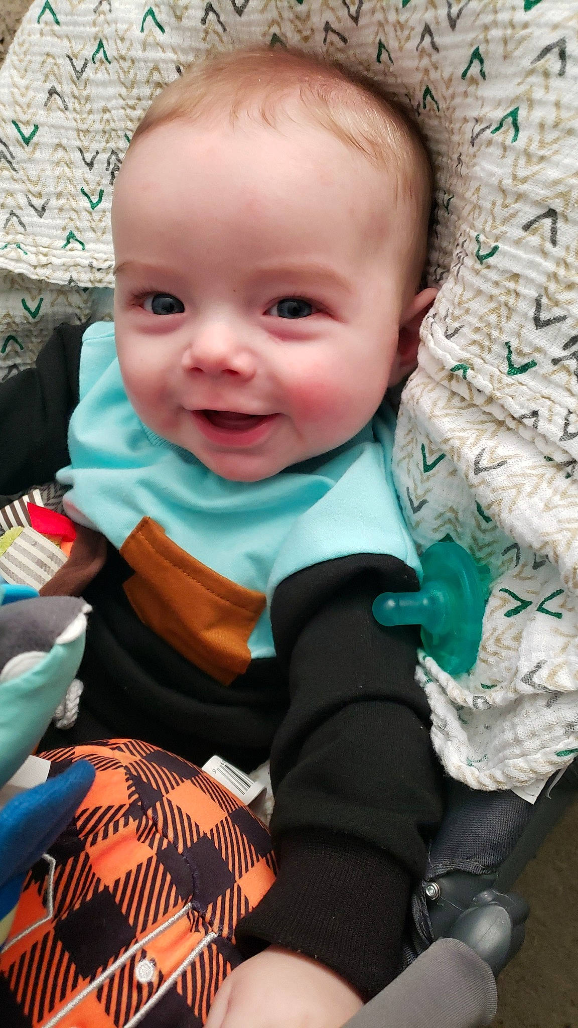 Bearet is registered to the contest to win money with this photo: baby, baby_products, baby_toddler_clothing, cheek, child, dress, event, eye, facial_expression, fun, grass, happy, head, iris, joy, person, sitting, skin, sleeve, smile