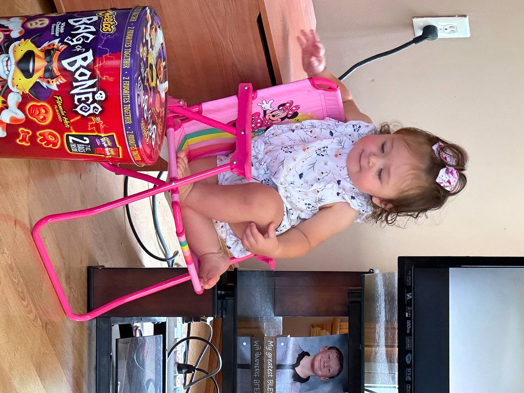Camryn joined the competition — help win amazing prizes! art, baby, baby_toddler_clothing, child, dress, fashion_accessory, fashion_design, happy, joy, magenta, pattern, person, picture_frame, pink, purple, room, sitting, sleeve, smile, television
