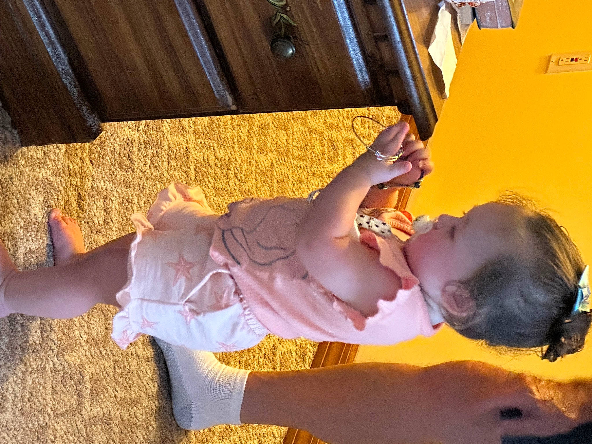Camryn joined the competition — help win amazing prizes! baby, beauty, child, comfort, eyewear, fun, happy, human_leg, leisure, orange, person, room, sitting, sunlight, thigh, tints_and_shades, toddler, travel, wood