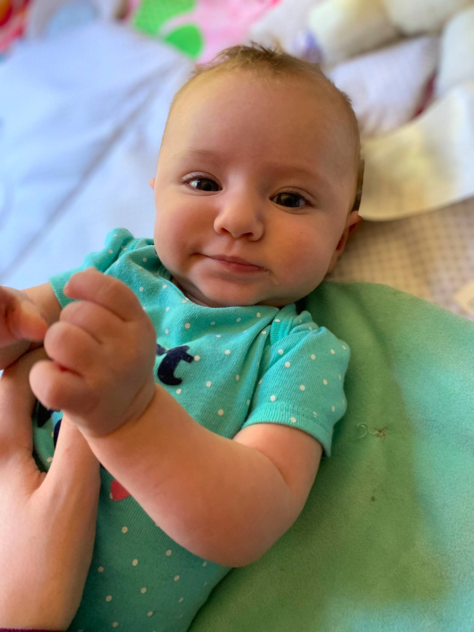 Sienna Joy is registered to the contest to win money with this photo: baby, beauty, cheek, child, eye, face, finger, green, hand, head, lip, nose, person, skin, thumb, toddler