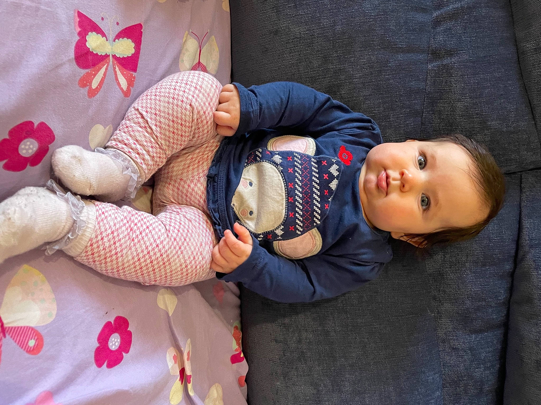 Rahela is registered to the contest to win money with this photo: arm, baby, baby_sleeping, baby_toddler_clothing, beauty, child, comfort, finger, hand, human_body, knee, leg, mammal, mouth, person, skin, smile, textile, thigh, toddler