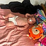 Lyna participe au concours pour gagner de l'argent avec cette photo : baby, bed, blanket, child, comfort, cute, diaper, head, indoor, infant, lying_down, orange_toy, pacifier, person, pink_bed_sheet, plush_toy, rainbow_blanket, skin, sleeping_area, soft_toy