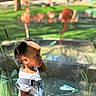 Ja Nice joined the competition — help win amazing prizes! adult, animal, baby, clothing, face, flower, grass, head, male, man, outdoors, pants, person, photography, plant, portrait, shorts, sitting, water, zoo