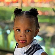 Ja Nice is registered to the contest to win money with this photo: accessories, blackhair, bodypart, child, clothing, face, female, finger, frown, girl, hair, hand, happy, head, pants, person, photography, portrait, shoulder, smile