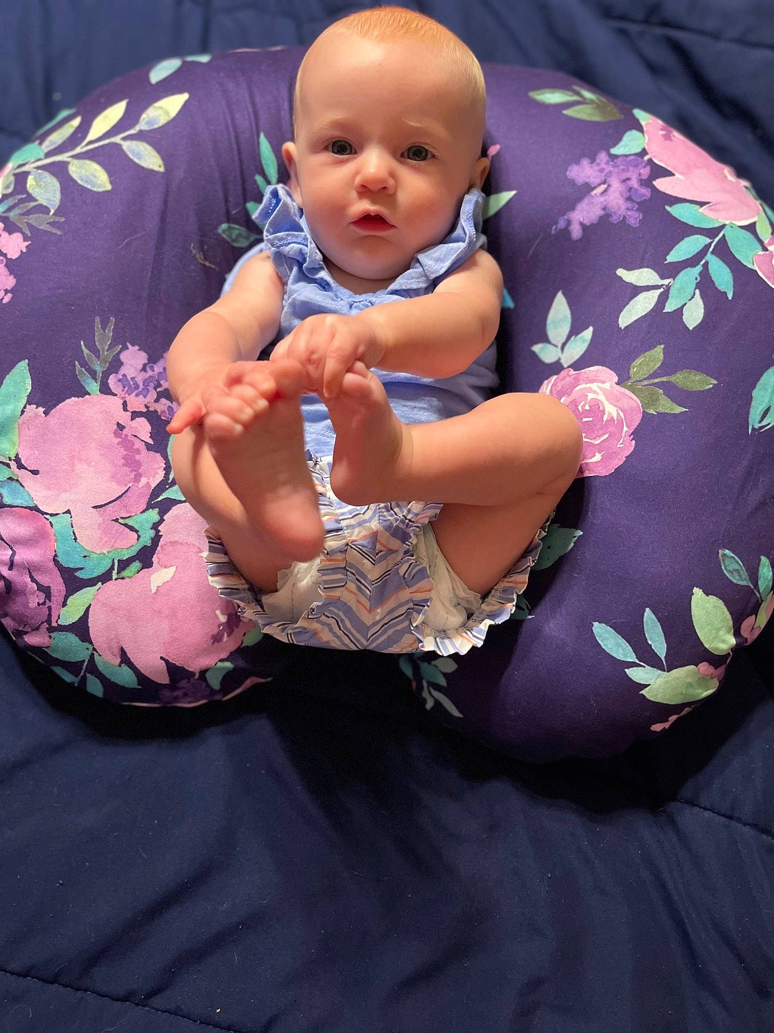 Haven is registered to the contest to win money with this photo: baby, baby_toddler_clothing, child, comfort, event, eye, facial_expression, finger, fun, hand, happy, head, headgear, lap, magenta, person, pink, purple, sitting, thigh