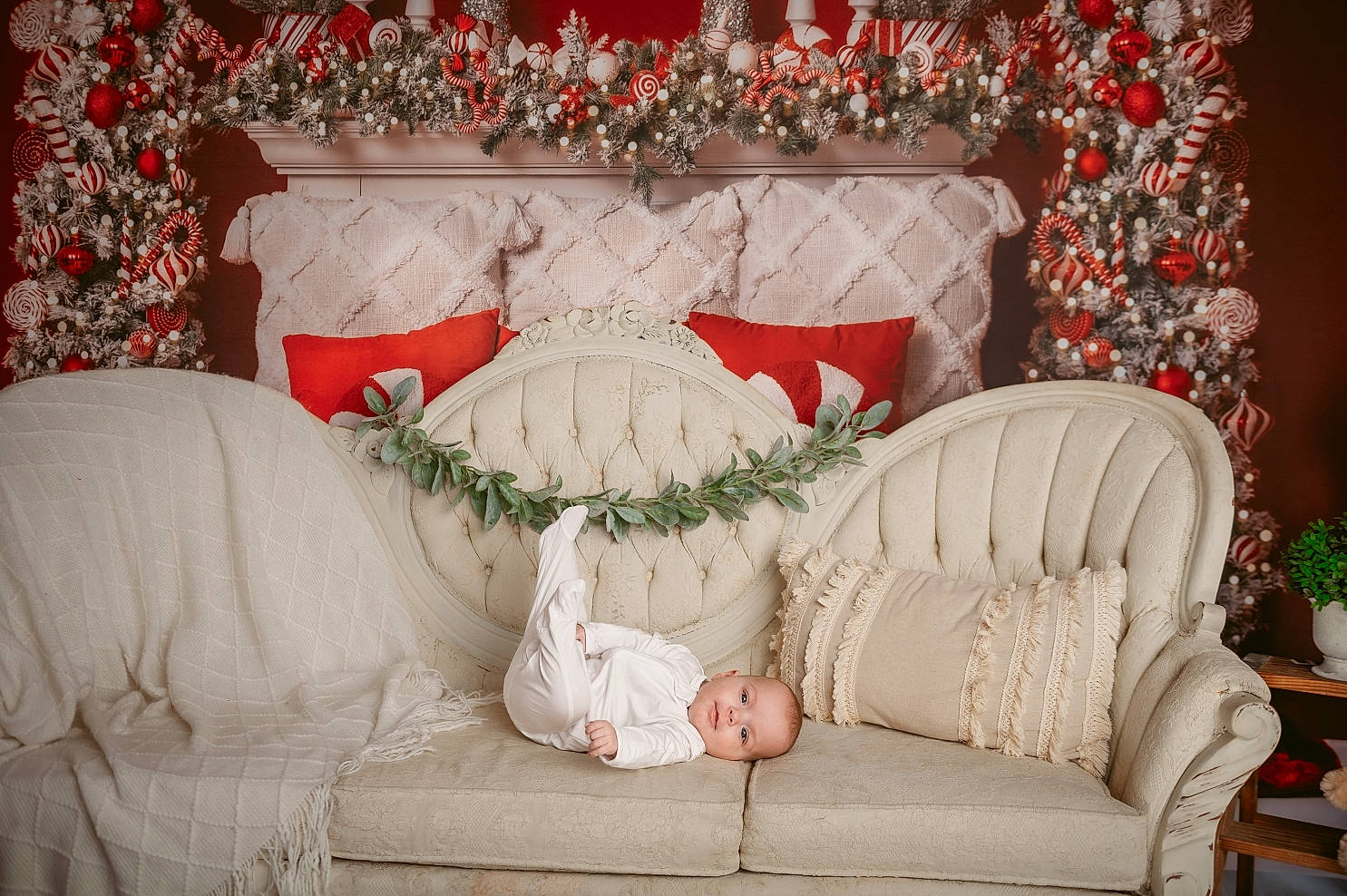 Braelynn joined the competition — help win amazing prizes! christmas_decoration, christmas_ornament, comfort, couch, decoration, event, flower_arranging, furniture, linens, living_room, ornament, pattern, peach, person, petal, pillow, pink, plant, rectangle, room