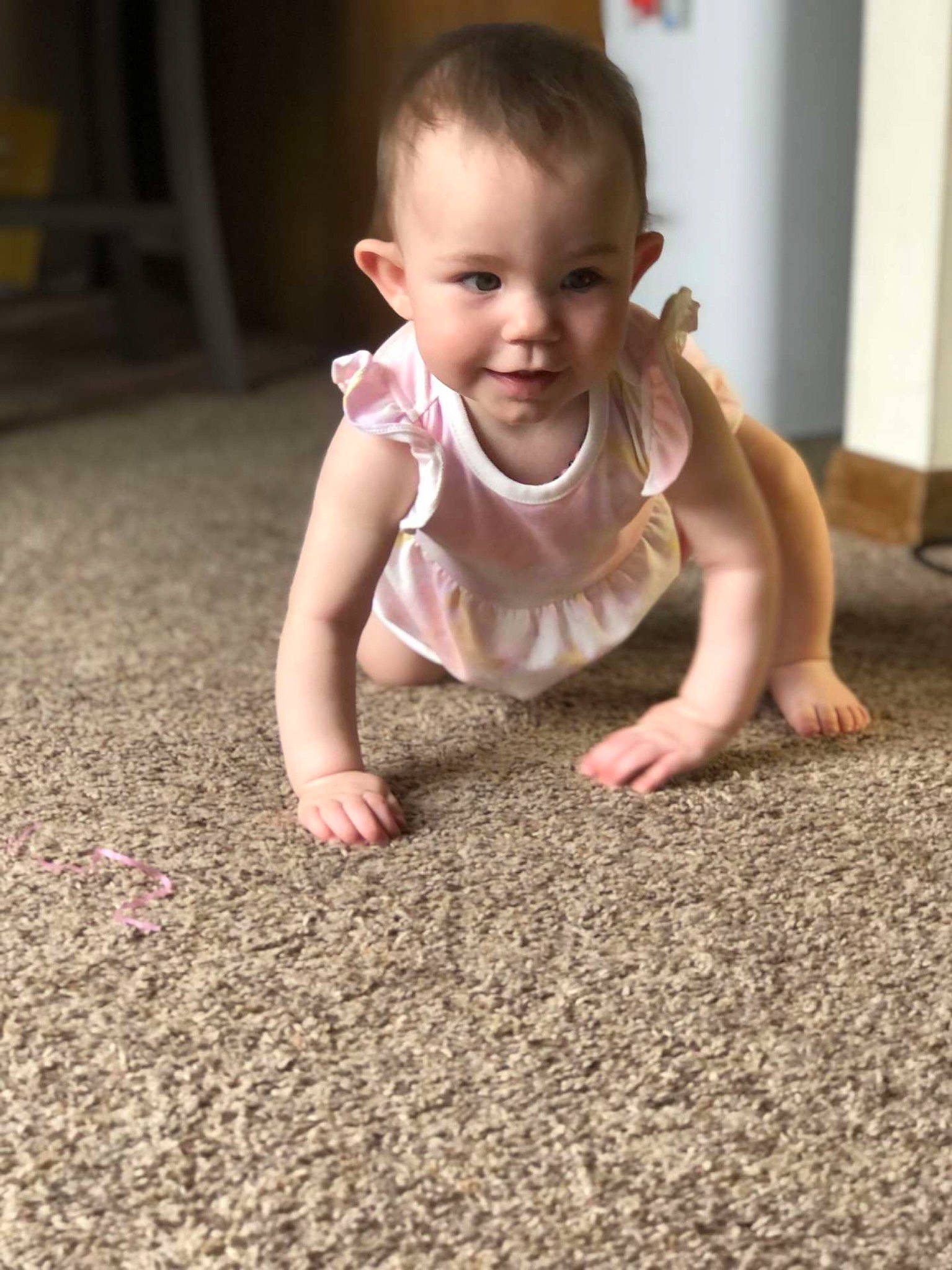 Willow joined the competition — help win amazing prizes! baby, baby_toddler_clothing, cheek, crawling, dress, eye, face, finger, floor, flooring, grass, happy, head, human_body, nose, people_in_nature, person, skin, smile, toddler