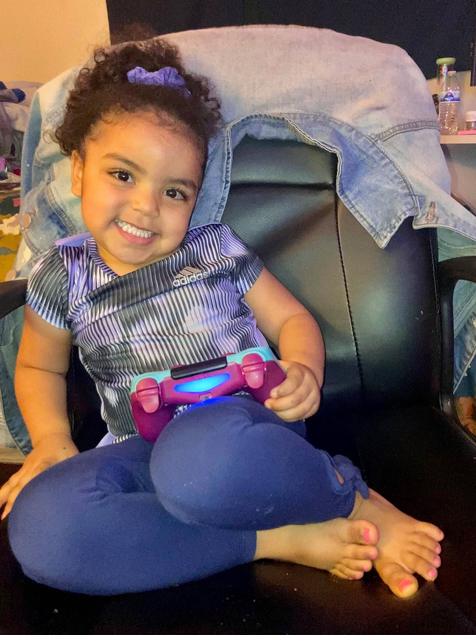 Isabella Dantzler is registered to the contest to win money with this photo: black_hair, chair, cheek, comfort, cool, electric_blue, fun, hairstyle, happy, joint, joy, knee, lap, leisure, mouth, person, product, purple, shoulder, skin