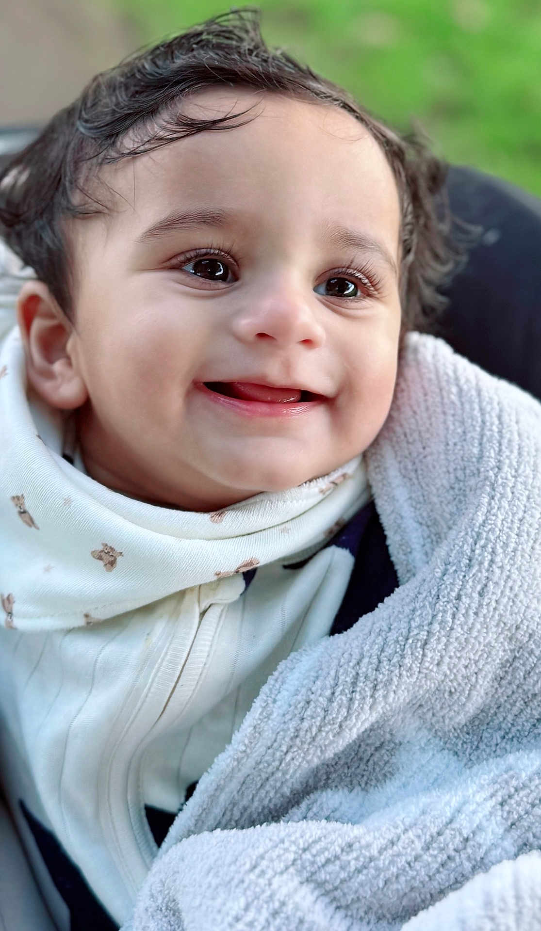 Akshad is registered to the contest to win money with this photo: baby, smiling, face, blanket, closeup, child, happy, cute, portrait, infant, soft, warm, cozy, clothing, eyes, mouth, skin, expression, outdoor, young