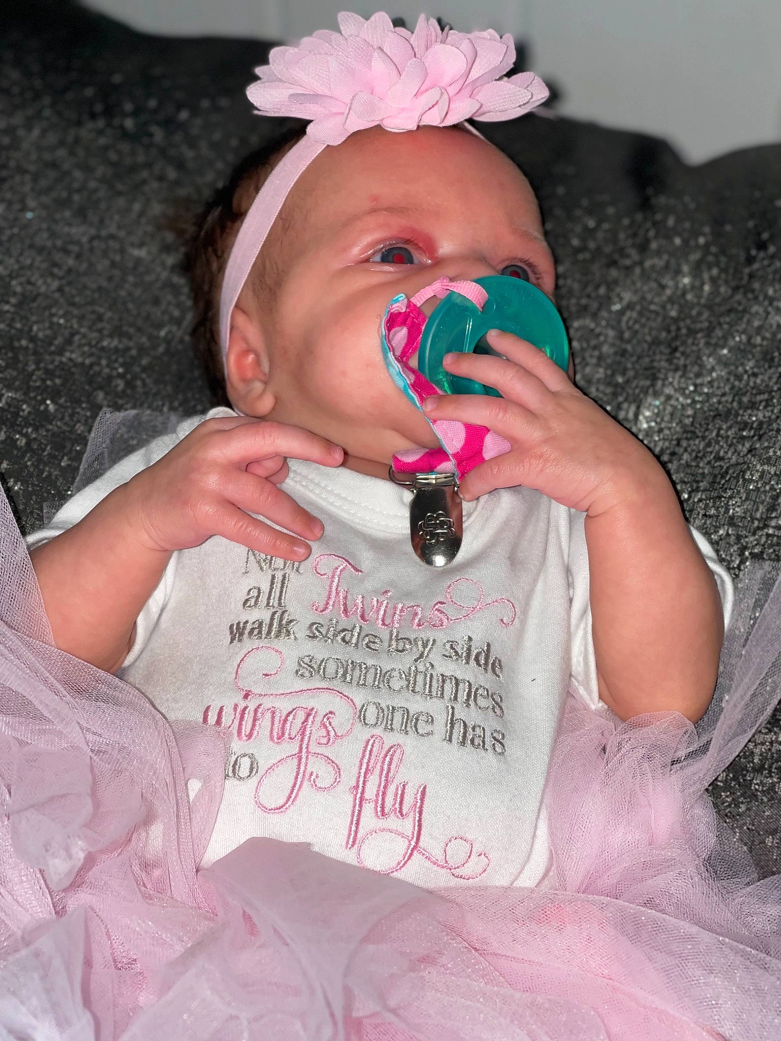 Kiara is registered to the contest to win money with this photo: baby, baby_toddler_clothing, cap, cheek, costume_hat, drinkware, eyelash, eyewear, finger, happy, head, headpiece, human, lip, magenta, nail, person, pink, skin, sweetness
