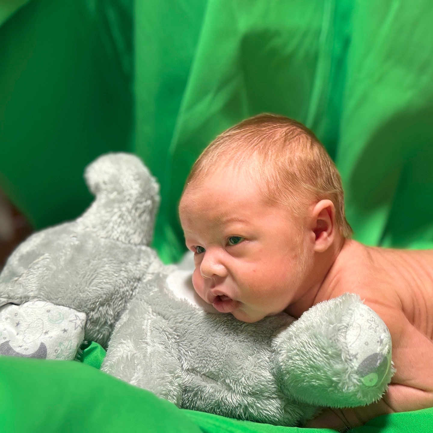Henry is registered to the contest to win money with this photo: architecture, baby, blanket, bodypart, building, cushion, face, finger, hand, head, homedecor, hospital, newborn, person, photography, portrait, sad, teddybear, towel, toy